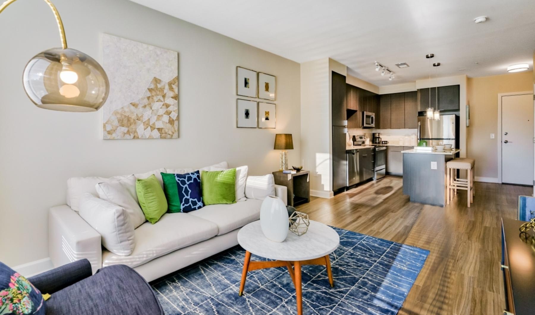 a living room with a couch and a table