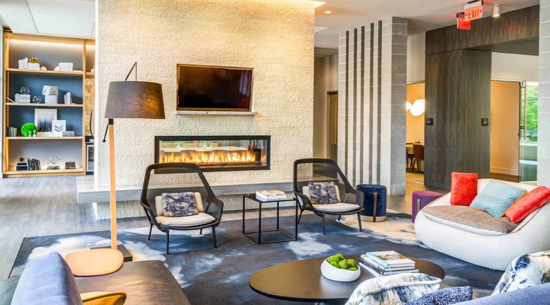 lounge with seating tv and fireplace