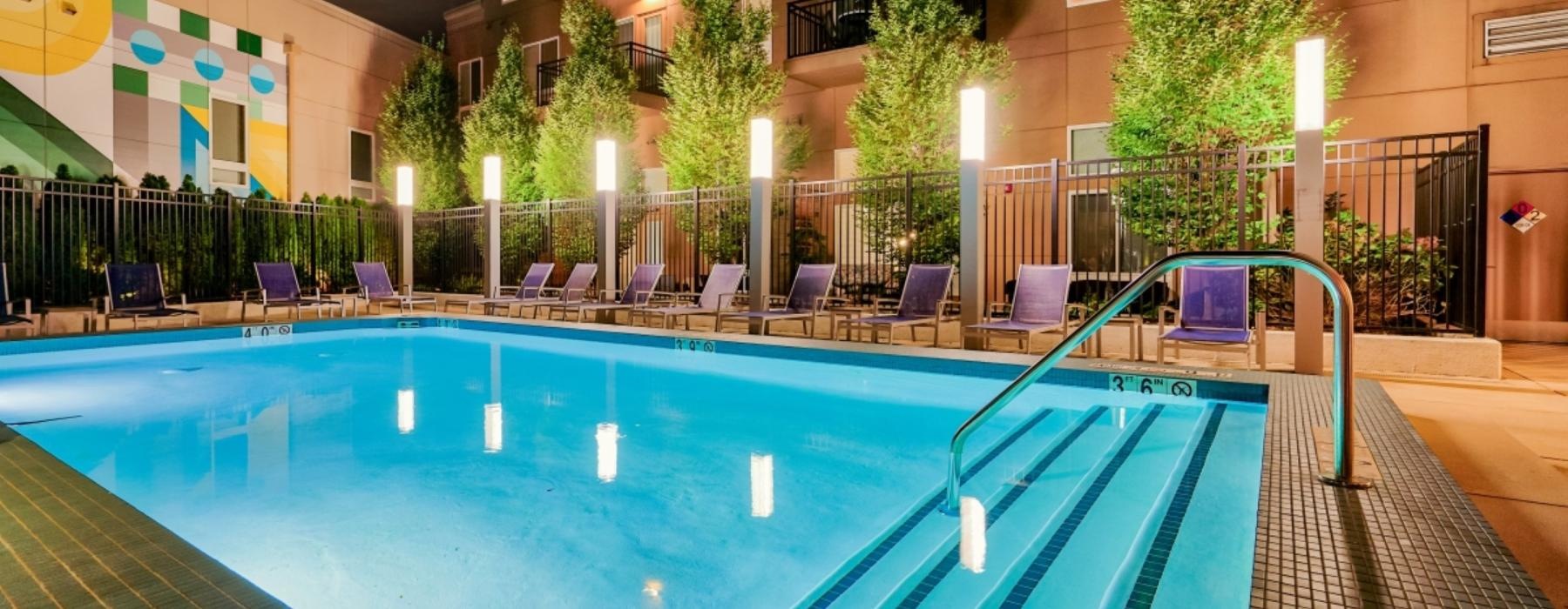 a swimming pool outside a building